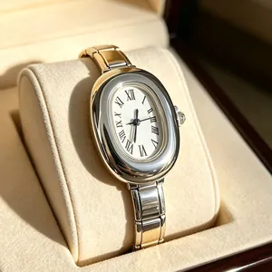 Elegant oval quartz watch with two-tone stainless steel strap in premium velvet box