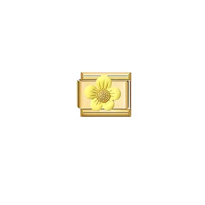 Detailed macro view of gold stainless steel Italian charm link with yellow flower design