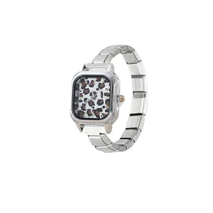 Detail of Italian modular quartz watch featuring a leopard print dial and silver band.