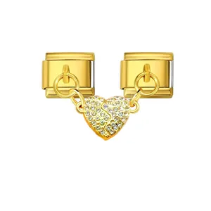 Detail showing a gold titanium steel Italian charm with a pavé crystal heart pendant.