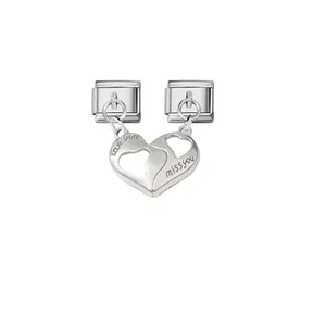 Detail of magnetic heart charms with 'love you' and 'miss you' engravings for modular link bracelet