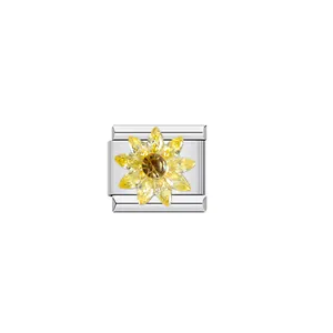 Detailed view of a stainless steel bracelet charm featuring a yellow crystal sunflower