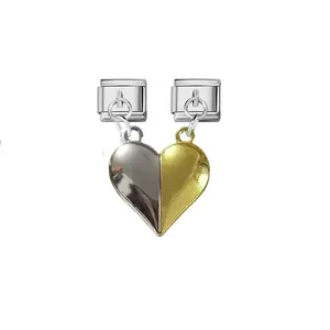 Detailed macro view of magnetic heart-shaped pendants for Italian modular steel bracelets