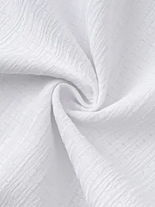 Macro close-up of white textured seersucker fabric for men's summer sleeveless shirt