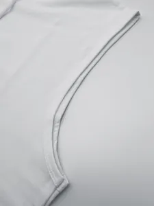 Close-up detail of double-stitched armhole on men's white hooded sports tank top