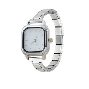 Detailed close-up of a square silver quartz watch head for modular link bracelets.