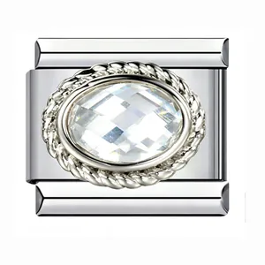 Detail of stainless steel Italian modular bracelet link with oval clear crystal charm