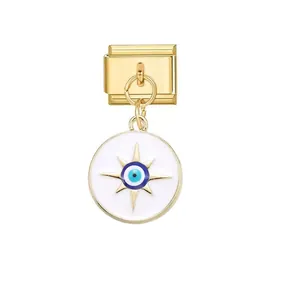 Macro view of Italian link bracelet charm featuring a gold-tone evil eye star pendant.
