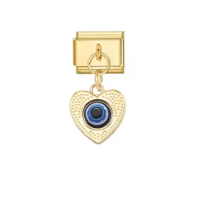 Detailed view of a gold-toned heart charm featuring a blue evil eye for modular bracelets