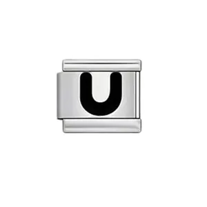 Macro detail view of a polished silver Italian charm link with a black letter U