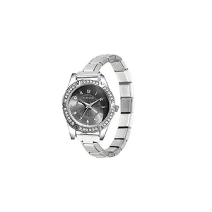 Detailed close-up of the elegant small dial watch featuring a rhinestone-encrusted bezel