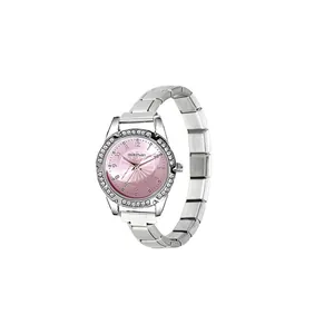 Close-up of pink dial watch with rhinestone bezel and silver link bracelet
