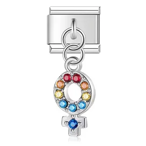 Detail view of silver stainless steel female symbol modular charm with rainbow rhinestones