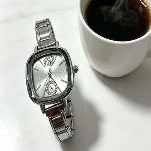 Elegant silver stainless steel watch with crystal-encrusted sub-dial and '12' digit