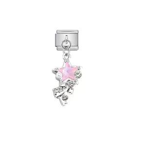 Detail view of a sparkling pink star charm on a modular stainless steel Italian link.