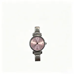 Detail view of an elegant silver modular quartz watch featuring a soft pink sunray dial