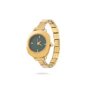 Side view detail of a vintage gold modular link watch with a dark green dial.