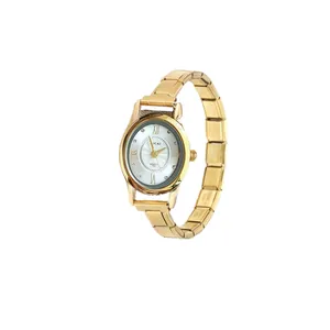 Close-up detail of a gold quartz watch featuring a modular DIY link bracelet and oval dial