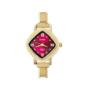 Montre à quartz élégante pour femme en forme de losange avec bracelet en acier doré