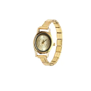 Detail view of stylish gold oval quartz watch featuring a DIY modular charm bracelet band