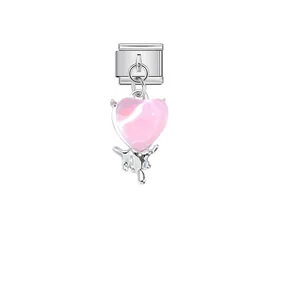 Close-up detail of a pink marble heart pendant on a stainless steel modular charm link.