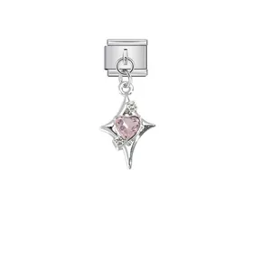 Close-up view of stainless steel modular charm with pink heart and star design.