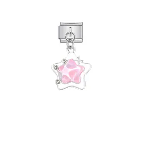 Detailed close-up of a pink star modular charm in stainless steel for DIY jewelry.