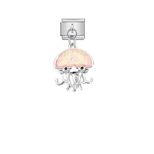 Detailed macro view of a pink iridescent jellyfish stainless steel Italian charm link.