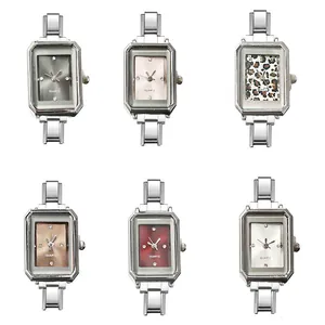 Vista detallada de seis cabezales de reloj de cuarzo rectangulares con diales de colores para DIY