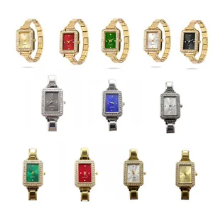 Detailed macro shot of square quartz watches with sparkling diamond bezels and metal straps.