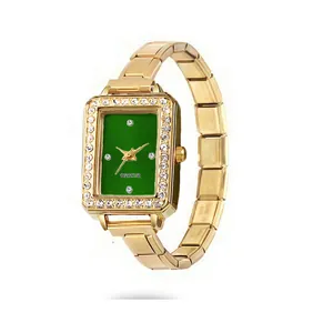 Close-up detail of a gold square quartz watch featuring a green dial and rhinestone bezel.