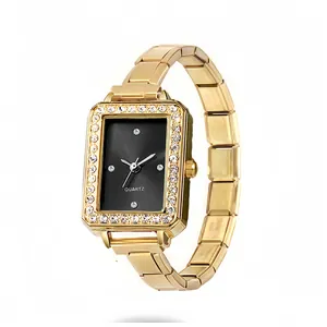 Detail view of elegant gold square quartz watch featuring a sparkling rhinestone bezel
