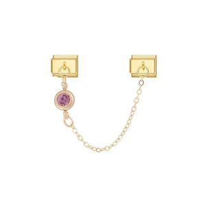 Macro detail view of elegant pink gemstone modular charm with gold chain for DIY bracelets