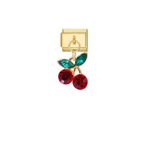 Detail view of cherry charm link with sparkling red and green crystals for DIY jewelry