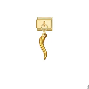 Detailed view of a gold-colored Corno horn pendant on a modular bracelet link charm