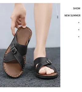 Detailed view of stylish men's black leather beach sandals with buckle and soft sole