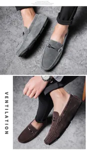 Close-up detail of men's suede driving loafers in gray and brown with metal bit.