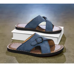 Detailed macro view of blue men's casual cross-strap slides featuring a stylish buckle design