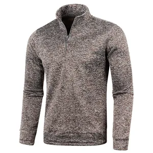 Close-up of men's quarter-zip sweatshirt with brown heathered knit pattern