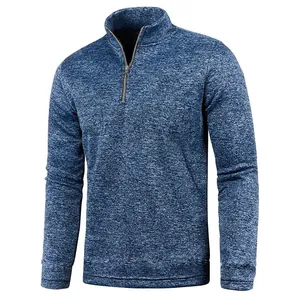 Close-up detail of a men's blue marled quarter-zip pullover with a high stand collar
