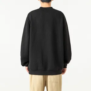 Detailed back view of a men's black long sleeve pullover with vertical ribbed texture