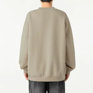 Back view detail of men's beige textured vertical ribbed long sleeve pullover sweater