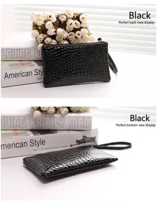 Black crocodile pattern clutch bag shown from the back and bottom for detail view