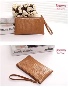 Stylish brown faux crocodile leather wristlet clutch shown from back and top angles