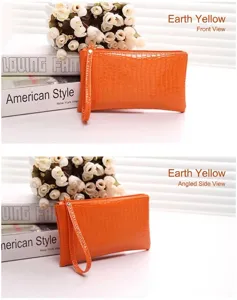 Detailed front and side views of an orange crocodile pattern clutch bag with wrist strap