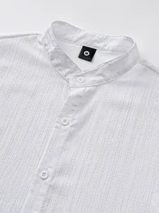 Detail view of white men's casual shirt with mandarin collar and textured fabric finish.