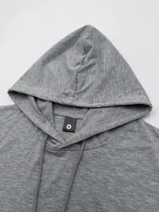 Close-up of grey hooded tank top showing neck detail and size tag