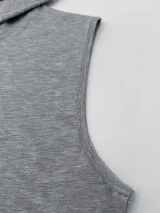 Detail showing armhole stitching and gray fabric texture of men's hooded tank top