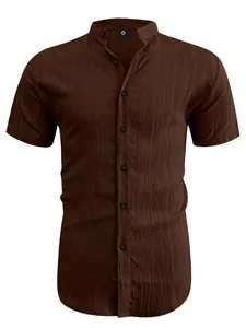 Close-up view of dark brown textured men's short-sleeve shirt with a mandarin collar