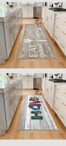 Detailed view of long kitchen floor mats with rustic wood grain and HOME lettering